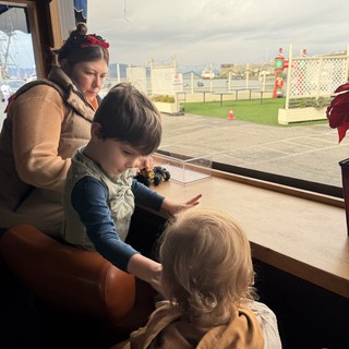 Children Learning Together at Museum Window Display