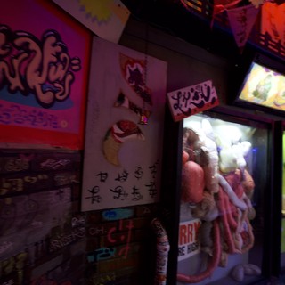 Retro Japanese Arcade Claw Machines and Graffiti Art