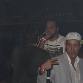 White Shirt and Two Hats at the Nightclub