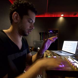 Marc Kinchen in the Studio on His Laptop