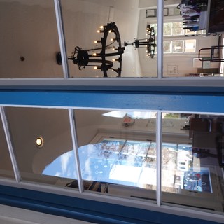Blue Framed Windows Into Elegant Interior Space