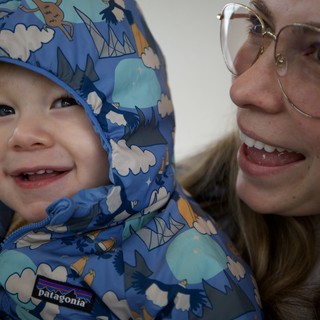 Joyful Winter Moment: Mother and Child in Patagonia Gear