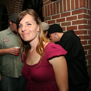 Woman Smiling at Halloween Party Night Out
