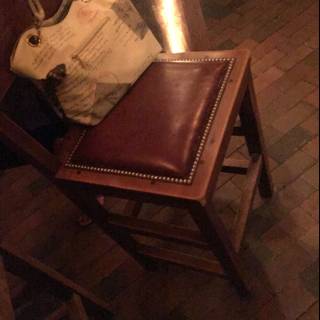 Chair and Purse on Brick Floor