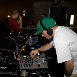 Mixing Beats in Green Hat