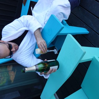 Dave Enjoying Champagne in Bathrobe Outdoors