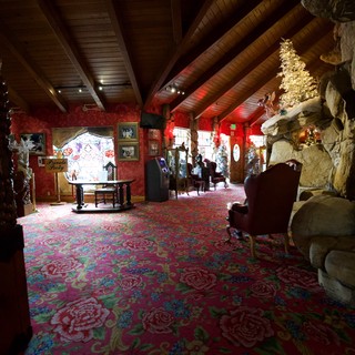 Madonna Inn's Ornate Red-Themed Interior Room with Stone Features