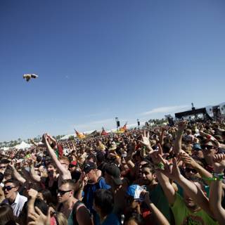 Coachella Crowd under a Blue Sky