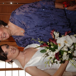 Bride and Mother Share Joyful Wedding Day Moment