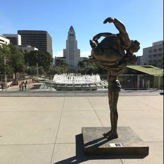 Man Doing Backflip in Front of Civic Center Mall Fountain