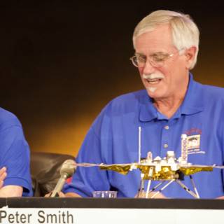 Charles Elachi and colleague discussing Phoenix landing