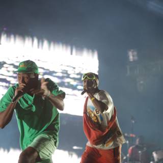 Green-clad performers rocking the stage