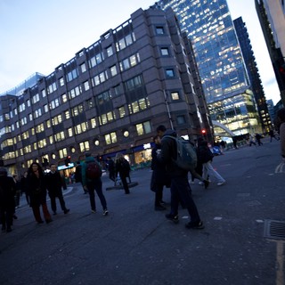 Dusk Commuters in London's Modern Financial District