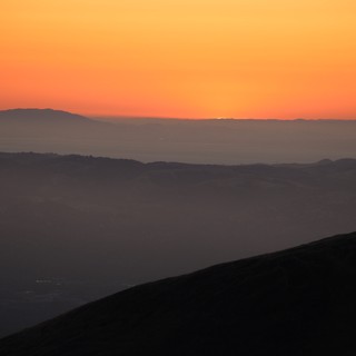 Layered Dusk Silhouettes Over California's Hazy Valleys