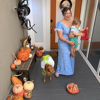 Halloween Porch Display with Family in Costume