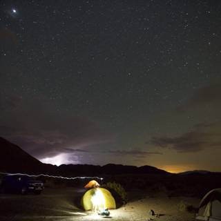 Lightning strikes at Night Sky Desert Camp