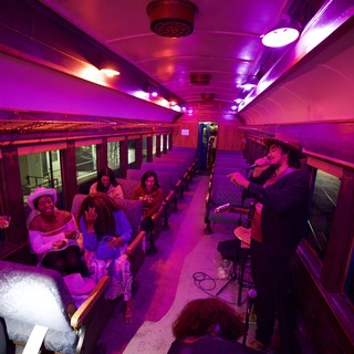 Intimate Live Performance Inside Converted Train Car Venue