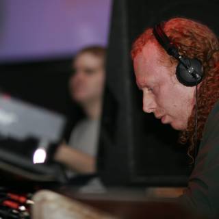 Red-haired DJ in Headphones