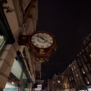 Historic Fortnum & Mason Clock at Night in London