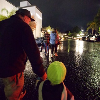 Nighttime Emergency Response in Rainy Parking Lot