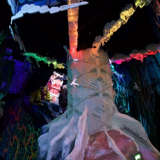 Illuminated Fantasy Sculpture with Colorful Dragon Canopy