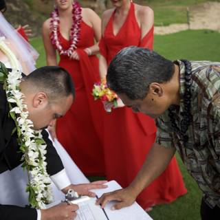 Signing the Marriage Certificate in a Beautiful Outdoor Ceremony