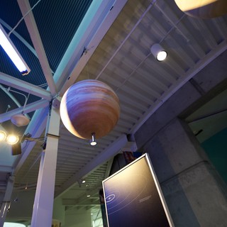 Illuminated Jupiter Model in Science Museum Exhibit