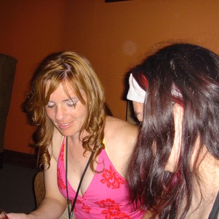 Two Women at a Casual Indoor Social Gathering