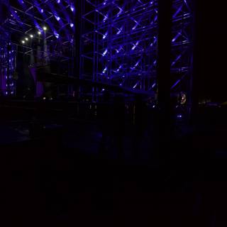 Blue Stage Lights Illuminate Coachella Concert Crowd