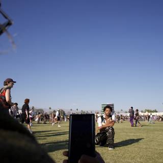 Connected Yet Alone: A Candid Moment at Coachella 2024
