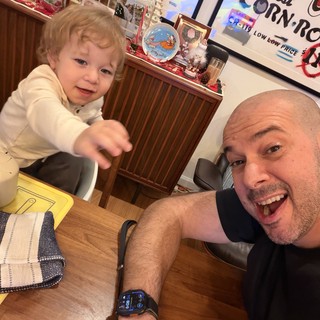 Father and Toddler Selfie at Festive Kitchen Table