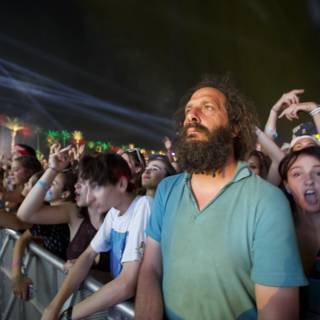 Bearded Man Commands Attention from Concert Crowd