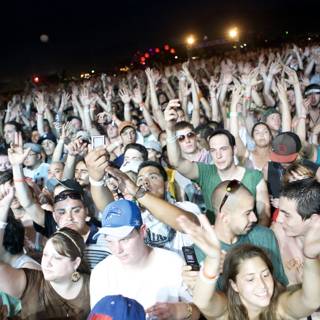 Hands Up in the Night Sky at Coachella Saturday