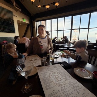 Family Dining Together at Waterfront Restaurant