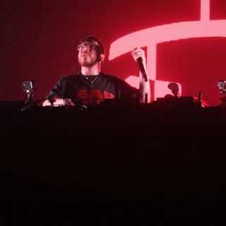 DJ Performs Under Red Glow at Wobbleland 2026