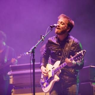 Dan Auerbach Rocks the Stage with his Guitar