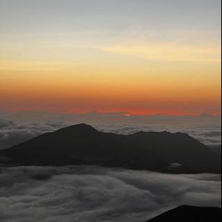 Above the Clouds: A Majestic Sunrise at Mauna Kea