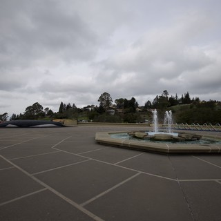 Fountain Plaza Under Dramatic Cloudy Skies