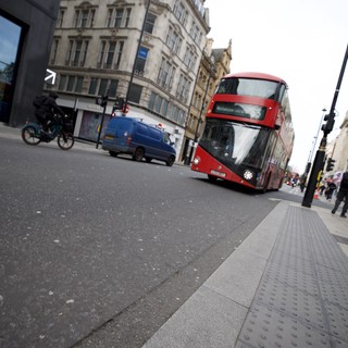 Modern Red Double-Decker Bus on London Street