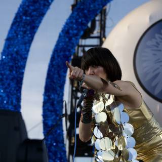 Karen Lee Orzolek commands the Coachella stage in a gold dress