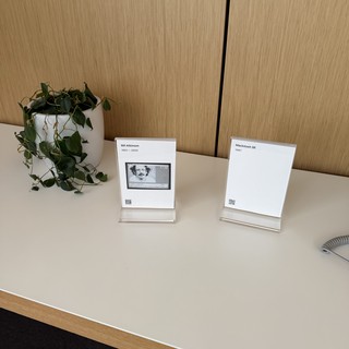 Memorial Cards on Office Desk with Plant