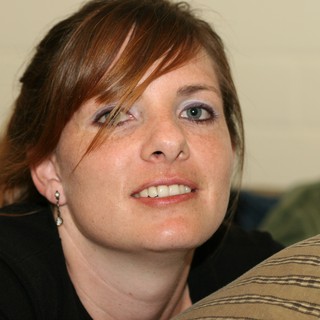 Candid Portrait of a Smiling Redheaded Woman