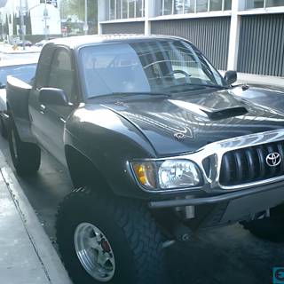 2002 Black Toyota Tacoma Parked on the Road