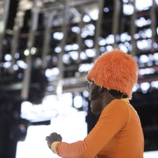 Orange-Clothed Man Commands the Stage at Cochella
