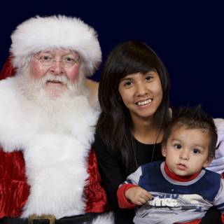 A Festive Family Photo with Santa Claus