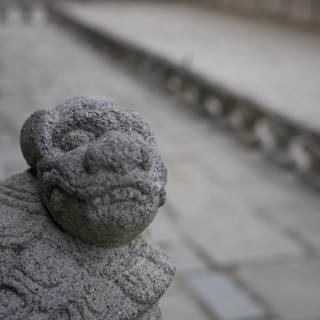 Guardian of the Stone Pathway: A Lion's Roar Encased in Stone