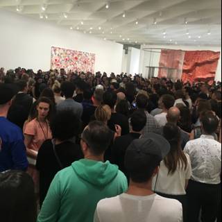 Art Gallery Crowd Gathers Around Painting