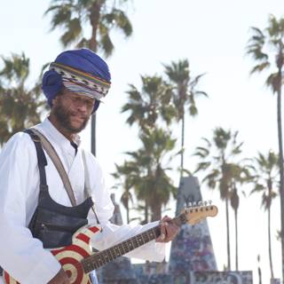 Turbaned Musician Strikes a Chord with Guitar
