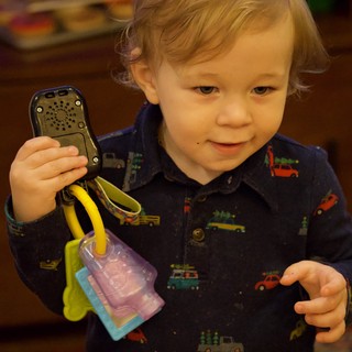 Toddler Playing with Toy Phone on Christmas