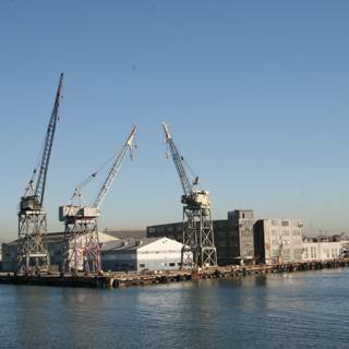 Busy Harbor with Cranes and Ships
